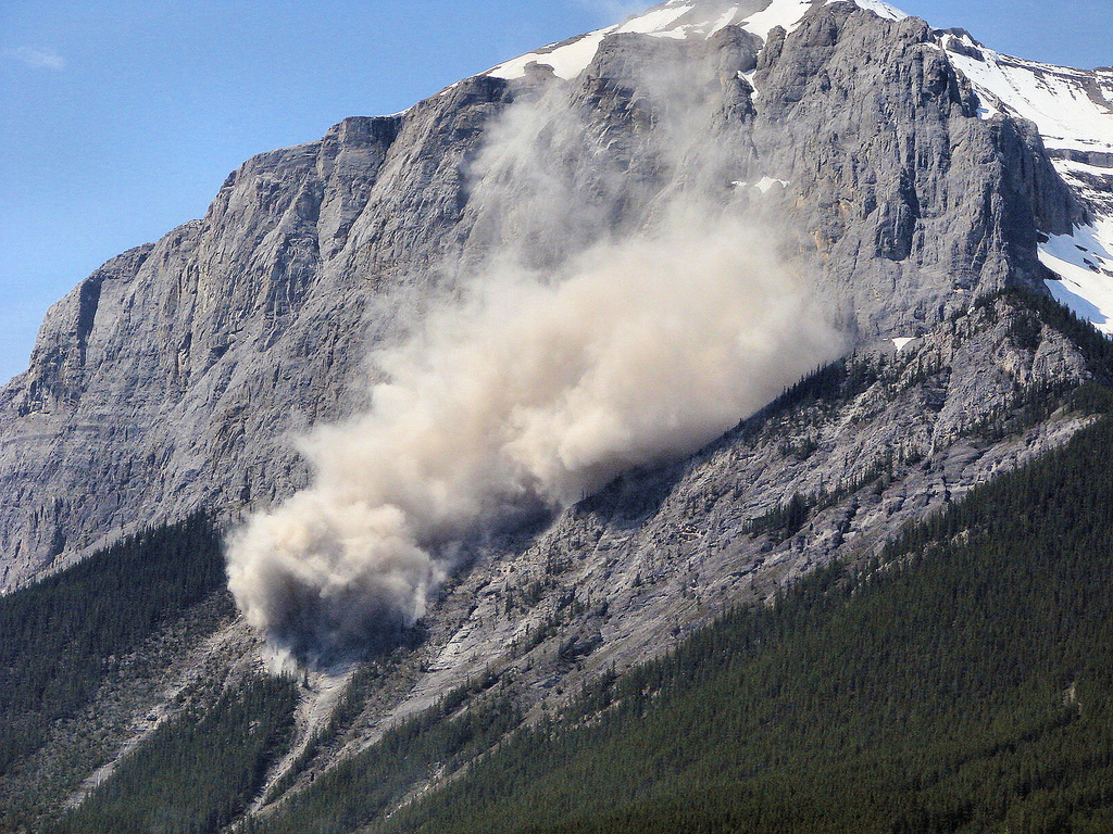 This landslide occurred on June, 1, 2007 on a mountain near Canmore in Alberta, Canada. The Flickr photo was taken by Sheri Teris (Creative Commons)