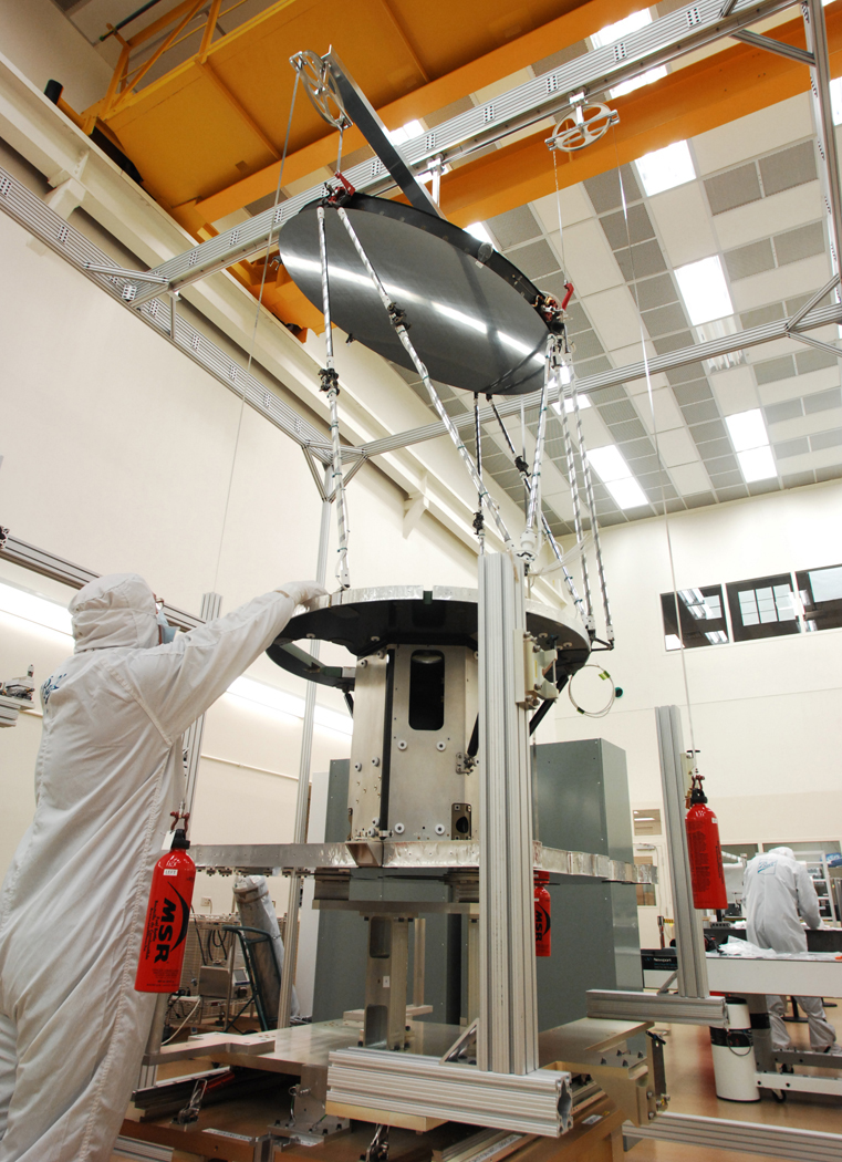 Construction of the GMI Instrument in a lab, with scientists