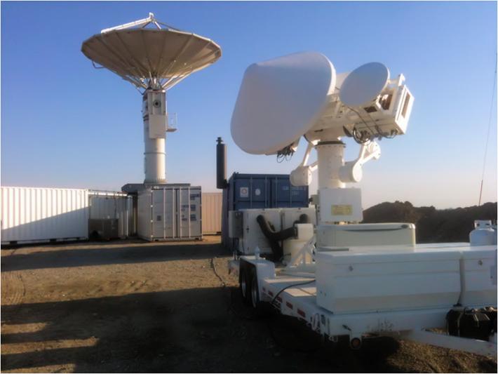 The NASA NPOL (right) and D3R (left) precipitation radars deployed south of Waterloo, Iowa, for the Iowa Flood Studies ground measurement campaign.