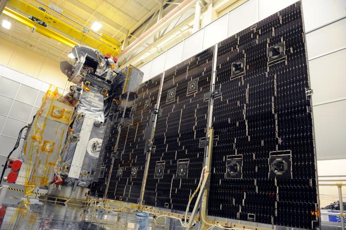 Deployment test of one of the GPM Core satellite's solar wings on Thursday, June 6, 2013. The array measures 18.8 feet long and 9.2 feet wide, 