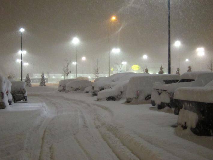 Snow covered cars at a parking lot at GCPex