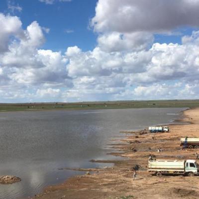 Water next to a desert.